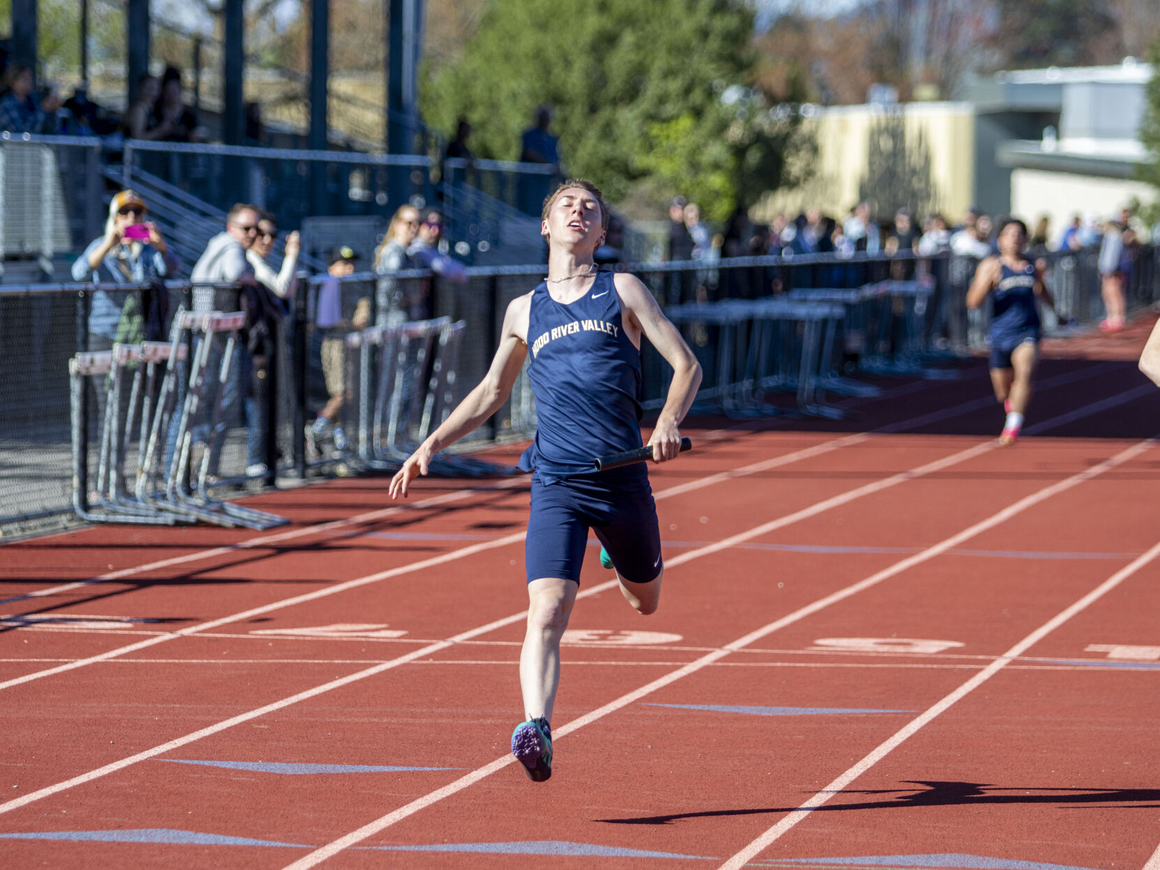 Eagle boys edge Milwaukie in dual track and field meet